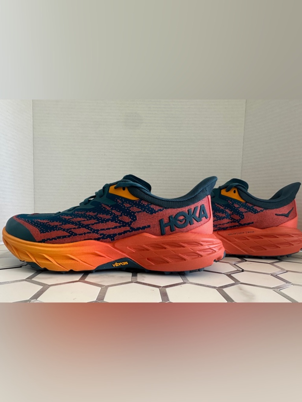 HOKA Speedgoat 5 Wide woman’s 9D Trail Running Shoe Blue Orange Lightly Used